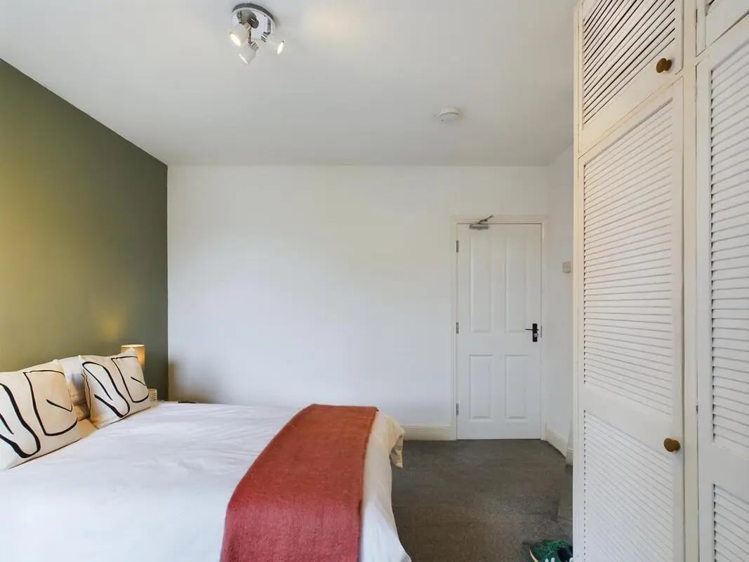Bed with white linen and pillows bedroom at 4 Bedroom House at 11, Charles Street West in Lincoln Student Accommodation