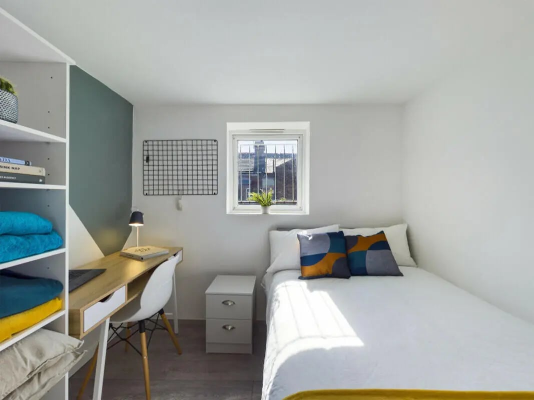 Bed desk shelves and chair bedroom at 2 Bedroom House at Flat 2 30, Haydn Avenue in Manchester Student Accommodation