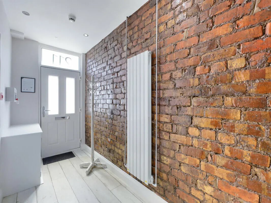 Door coat rack radiator hallway exterior at 8 Bedroom House at 211, Molyneux Road in Liverpool Student Accommodation