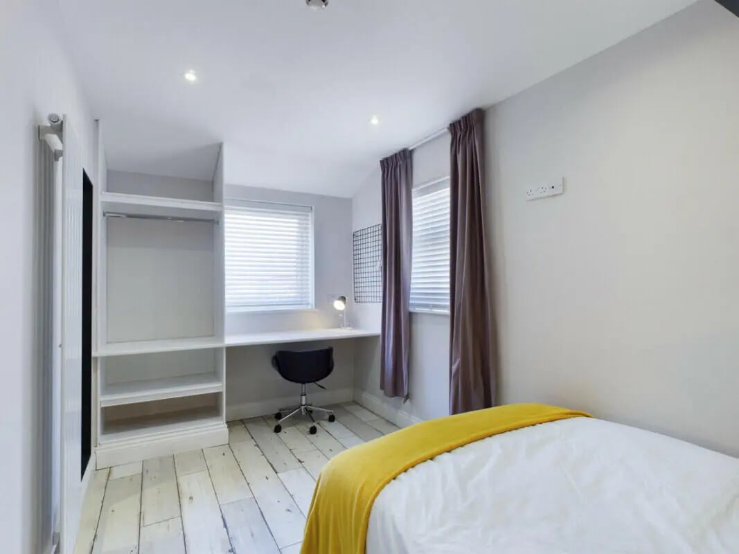 Wardrobe desk chair blinds bed Bedroom at 8 Bedroom House at 211, Molyneux Road in Liverpool Student Accommodation