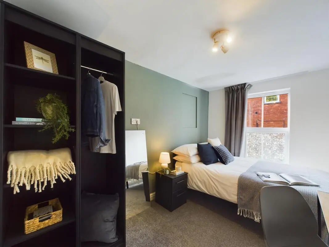 Wardrobe bed nightstand mirror Bedroom at 4 Bedroom House at 75, West Parade in Lincoln Student Accommodation