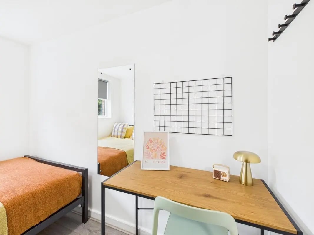 Two beds desk with lamp radio artwork bedroom at 2 Bedroom House at Flat 8, Grove Street Studios, The Groves in Liverpool Student Accommodation