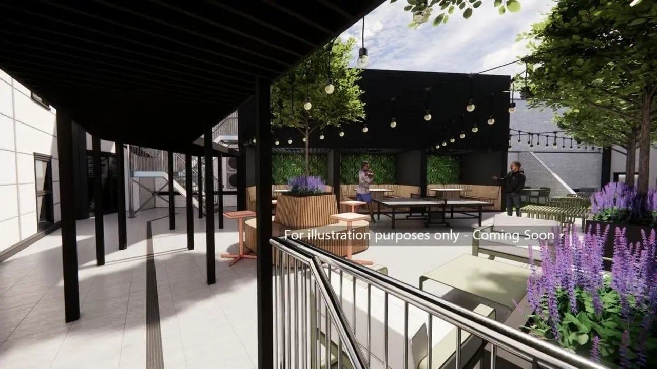 Outdoor lounge seating tables and plants common area at Harbour Court in Bristol Student Accommodation
