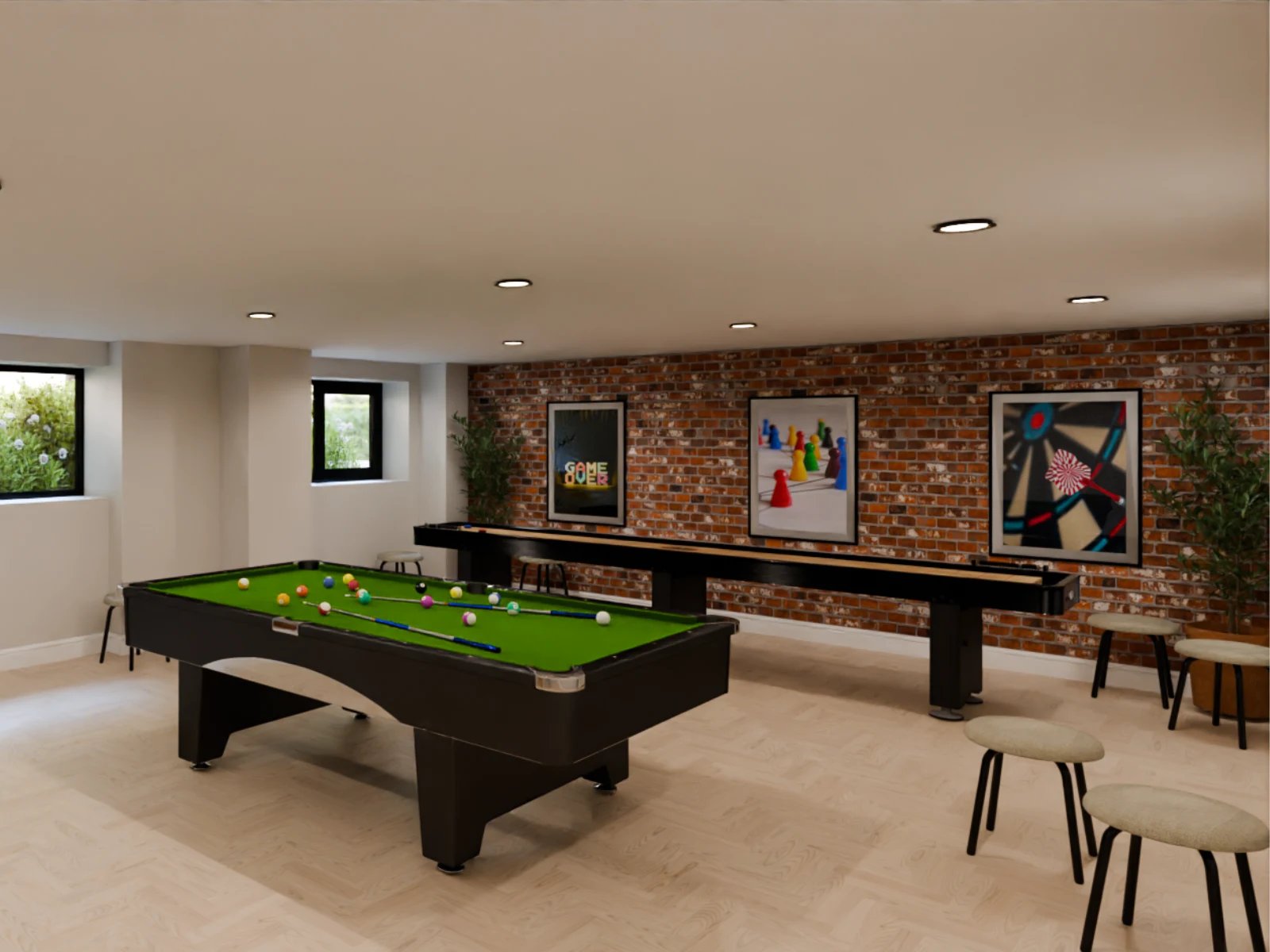 Pool table shuffleboards art and stools game room at Fitz and Knox in Cardiff Student Accommodation