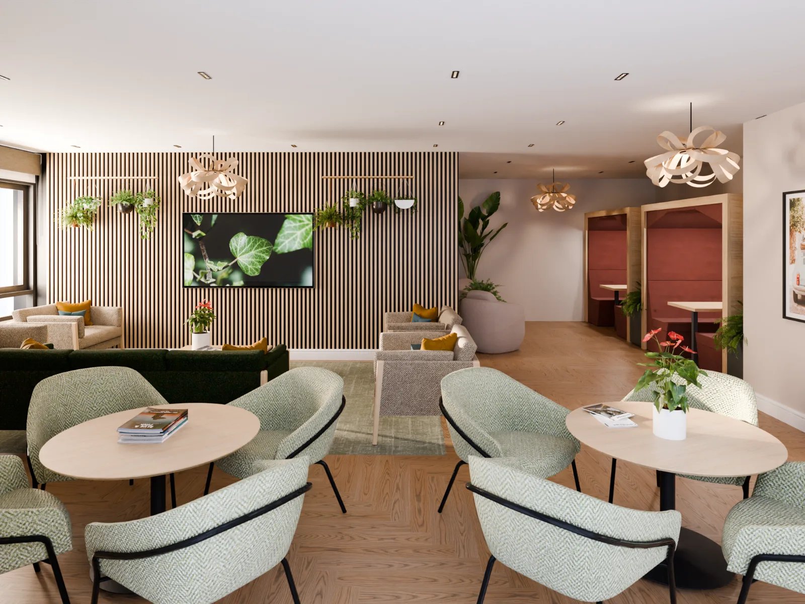 Modern lounge with green chairs and tables communal area at Fitz and Knox in Cardiff Student Accommodation