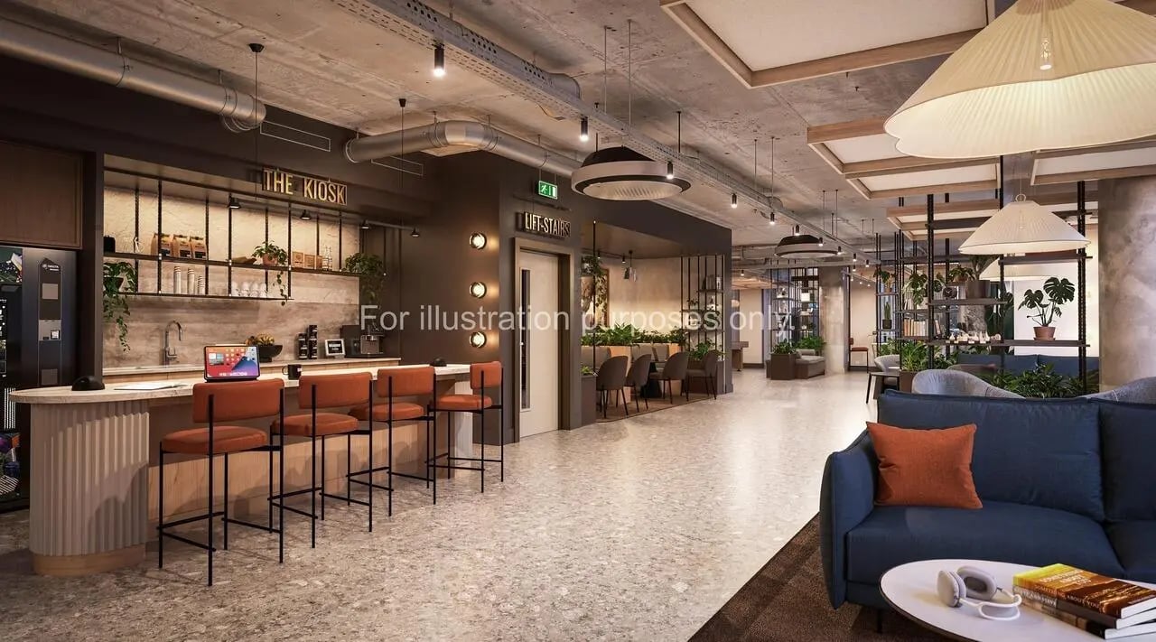 Bar with stools and sofa lounge area living room at Broadway Studios in Glasgow Student Accommodation