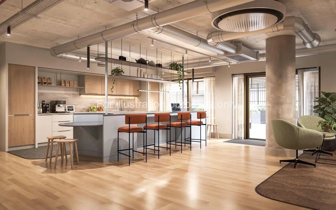 Bar stools coffee maker and seating area communal space at Broadway Studios in Glasgow Student Accommodation
