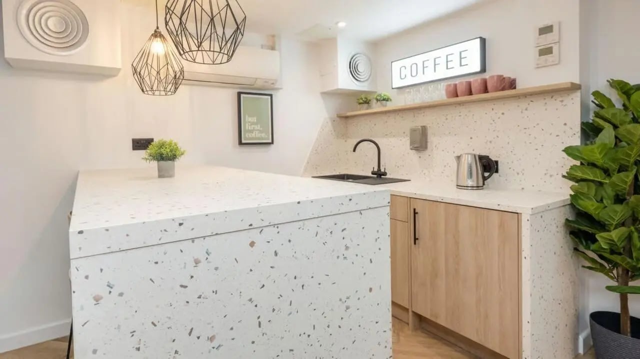 Modern kitchen counter sink kettle and coffee sign kitchen at Curzon House in Nottingham Student Accommodation