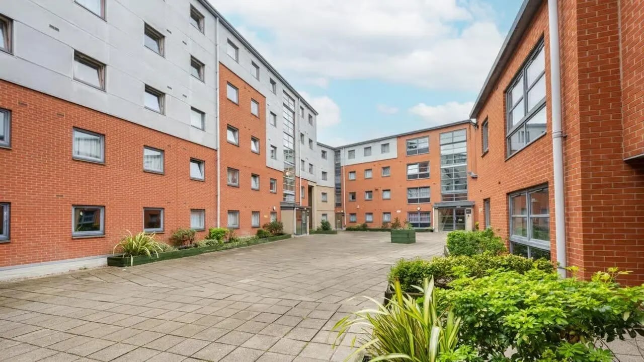 Courtyard with buildings green plants exterior at Curzon House in Nottingham Student Accommodation