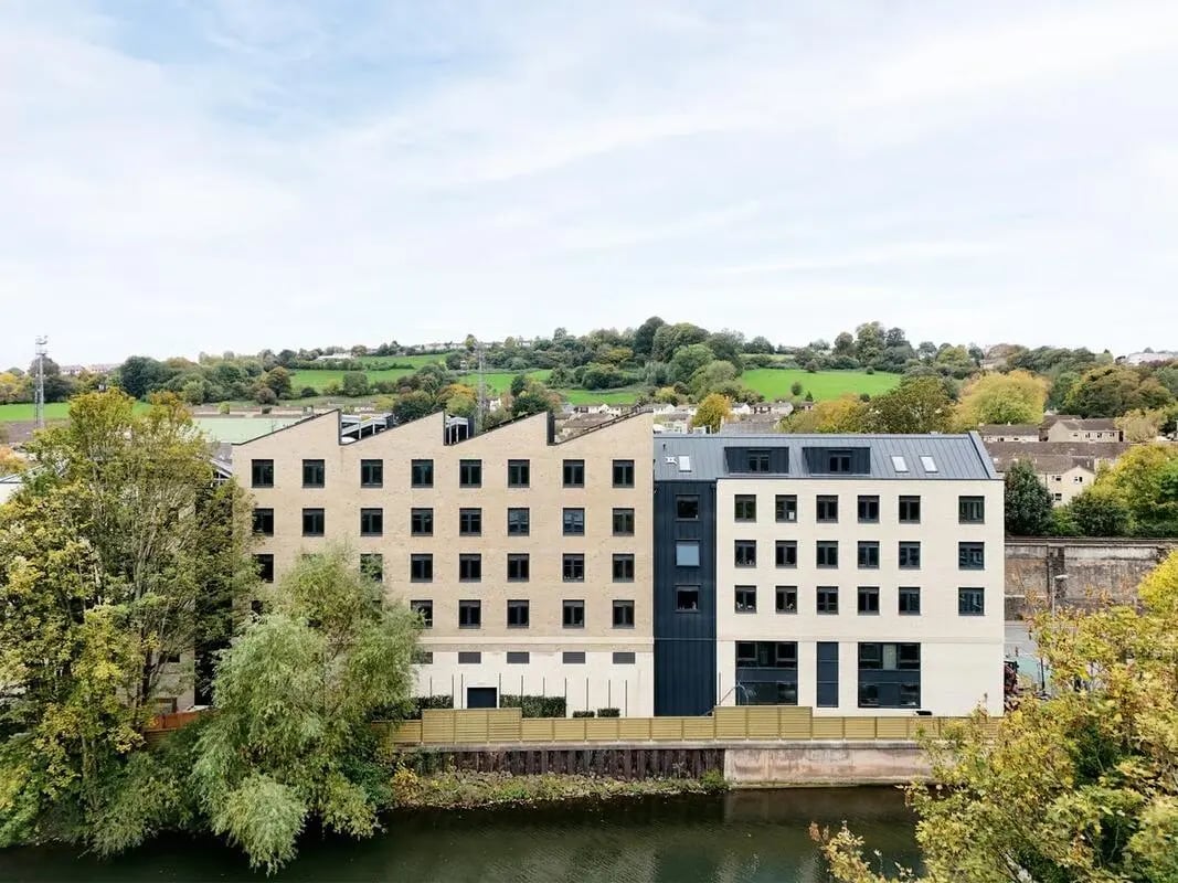 Modern student accommodation building exterior river view exterior at Hollis Wharf in Bath Student Accommodation