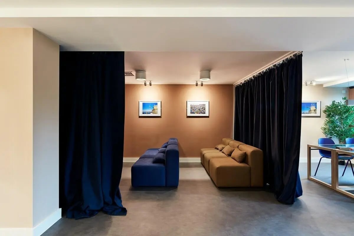 Two sofas artwork lighting dining table living room at Hollis Wharf in Bath Student Accommodation