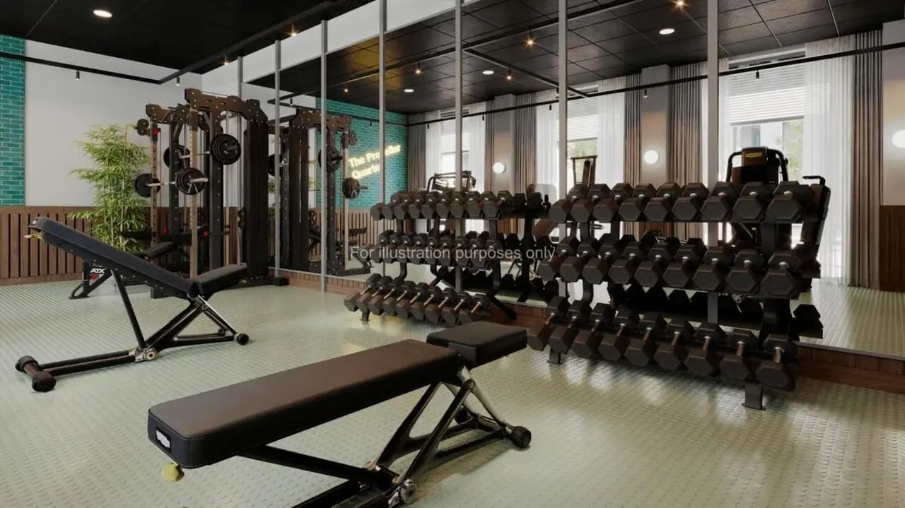 Dumbbell racks weight machines workout benches fitness gym at The Propeller Quarter in Bristol Student Accommodation