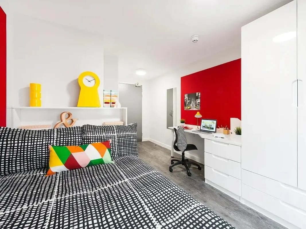 Bed desk chair wardrobe and shelf bedroom at Yugo Arofan House in Cardiff Student Accommodation