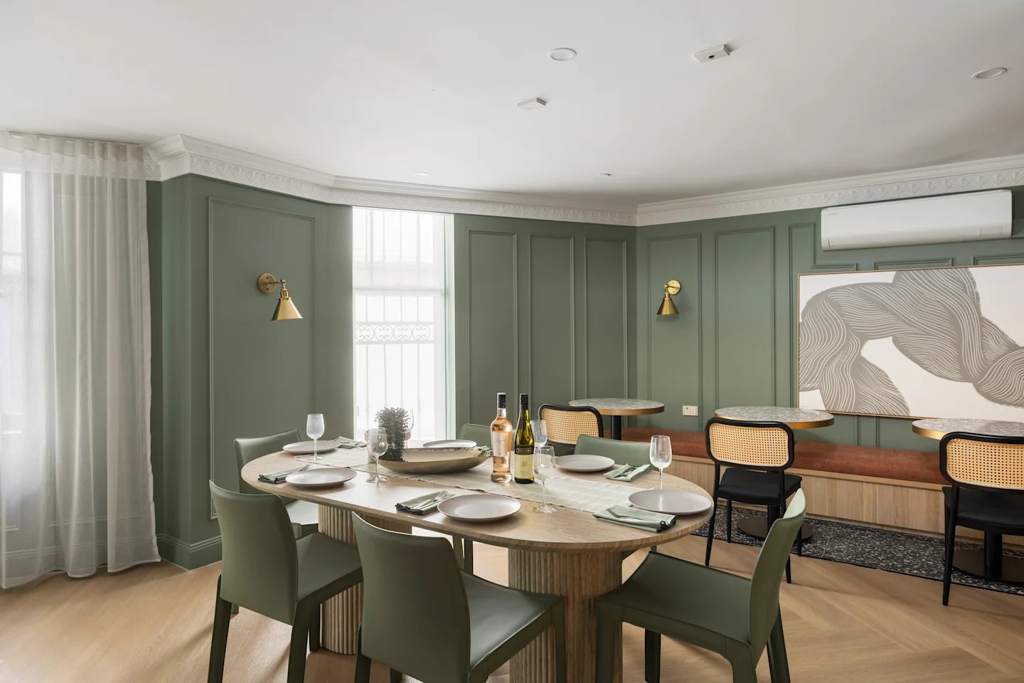 Dining table with place settings and chairs communal area at UKO Potts Point in Sydney Student Accommodation
