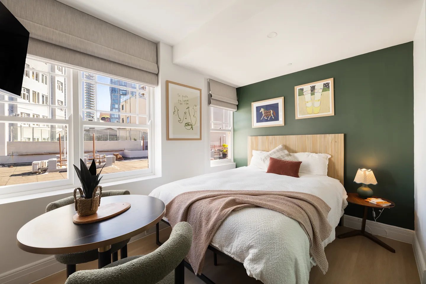 Bed table plant art bedroom at UKO Potts Point in Sydney Student Accommodation