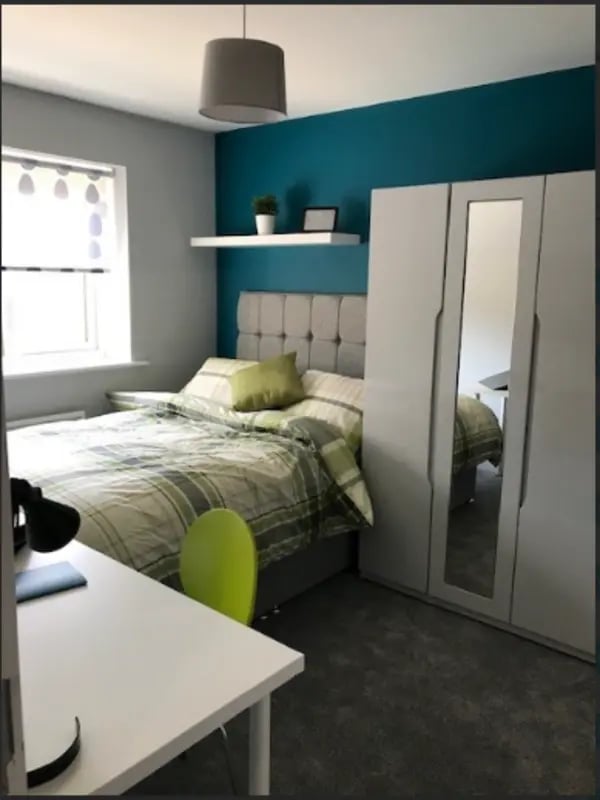 Bed desk wardrobe and chair bedroom at Varsity Beeston in Nottingham Student Accommodation
