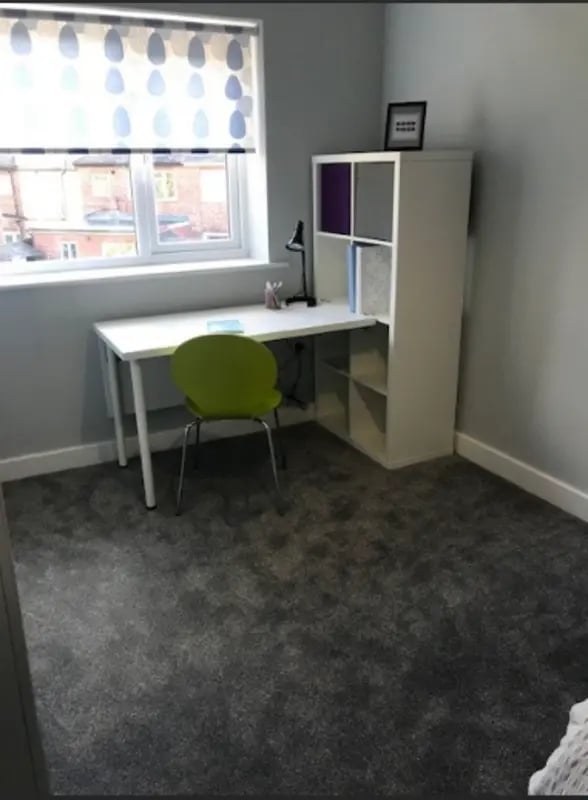 Desk chair shelving unit and window Study area at Varsity Beeston in Nottingham Student Accommodation