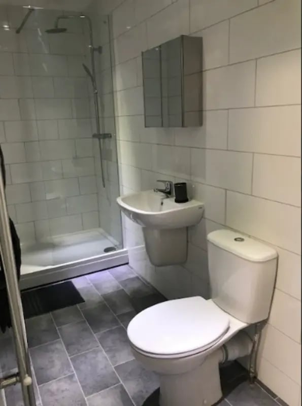 Toilet sink shower medicine cabinet bathroom at Varsity Beeston in Nottingham Student Accommodation
