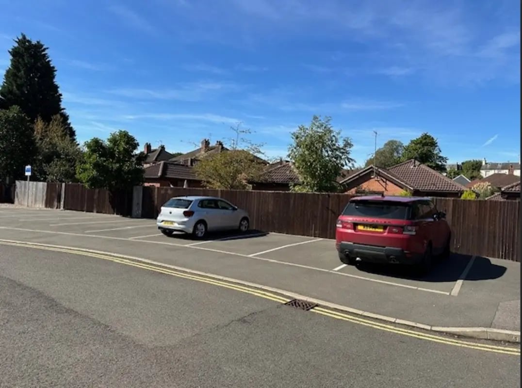 Cars parked in lot exterior at Varsity Beeston in Nottingham Student Accommodation