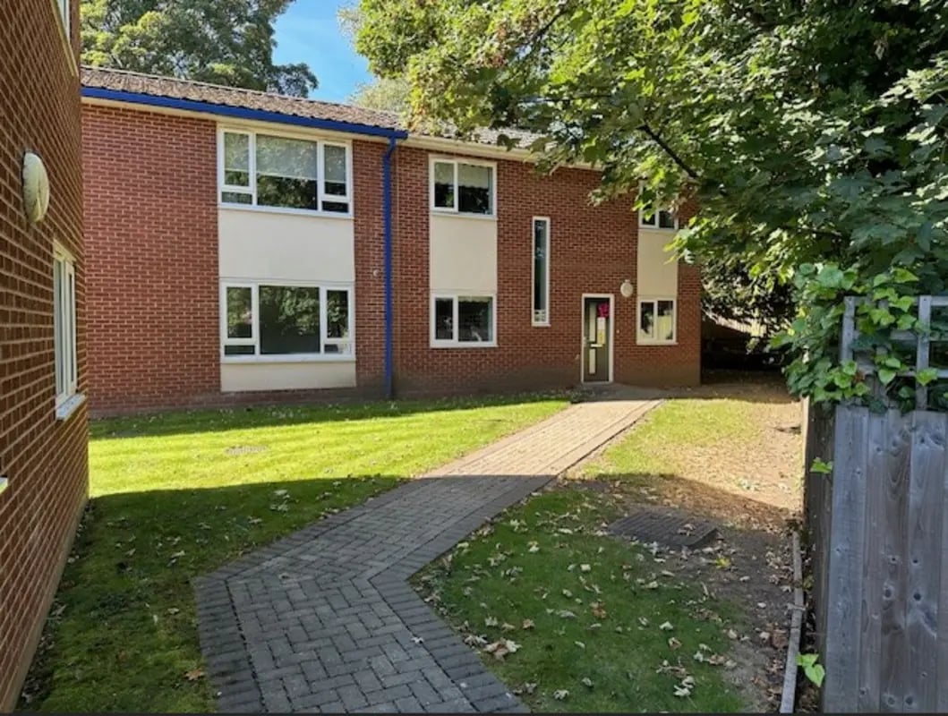 Red brick building with white windows exterior at Varsity Beeston in Nottingham Student Accommodation