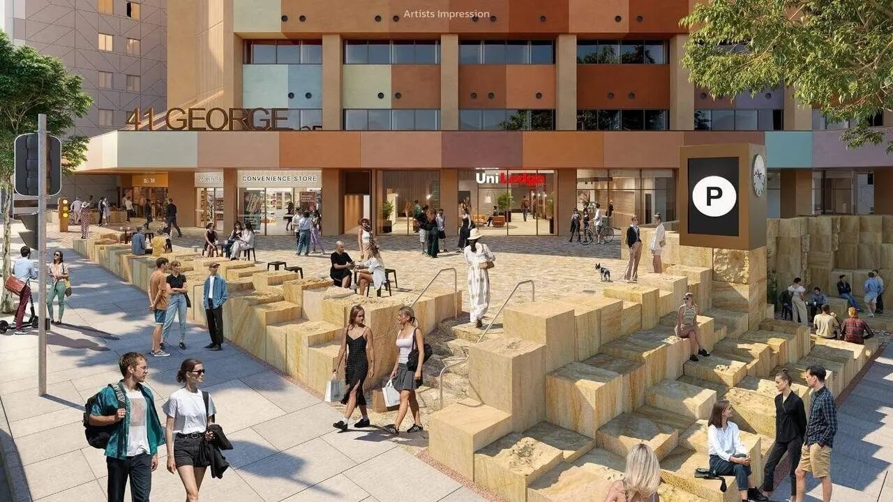 Building exterior with tiered seating and people exterior at UniLodge Brisbane City in Brisbane Student Accommodation