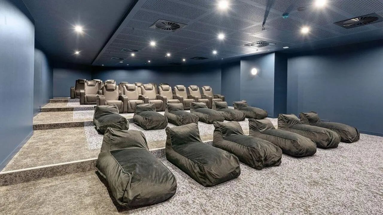Tiered seating with beanbags and cinema chairs. Entertainment room. at UniLodge Brisbane City in Brisbane Student Accommodation