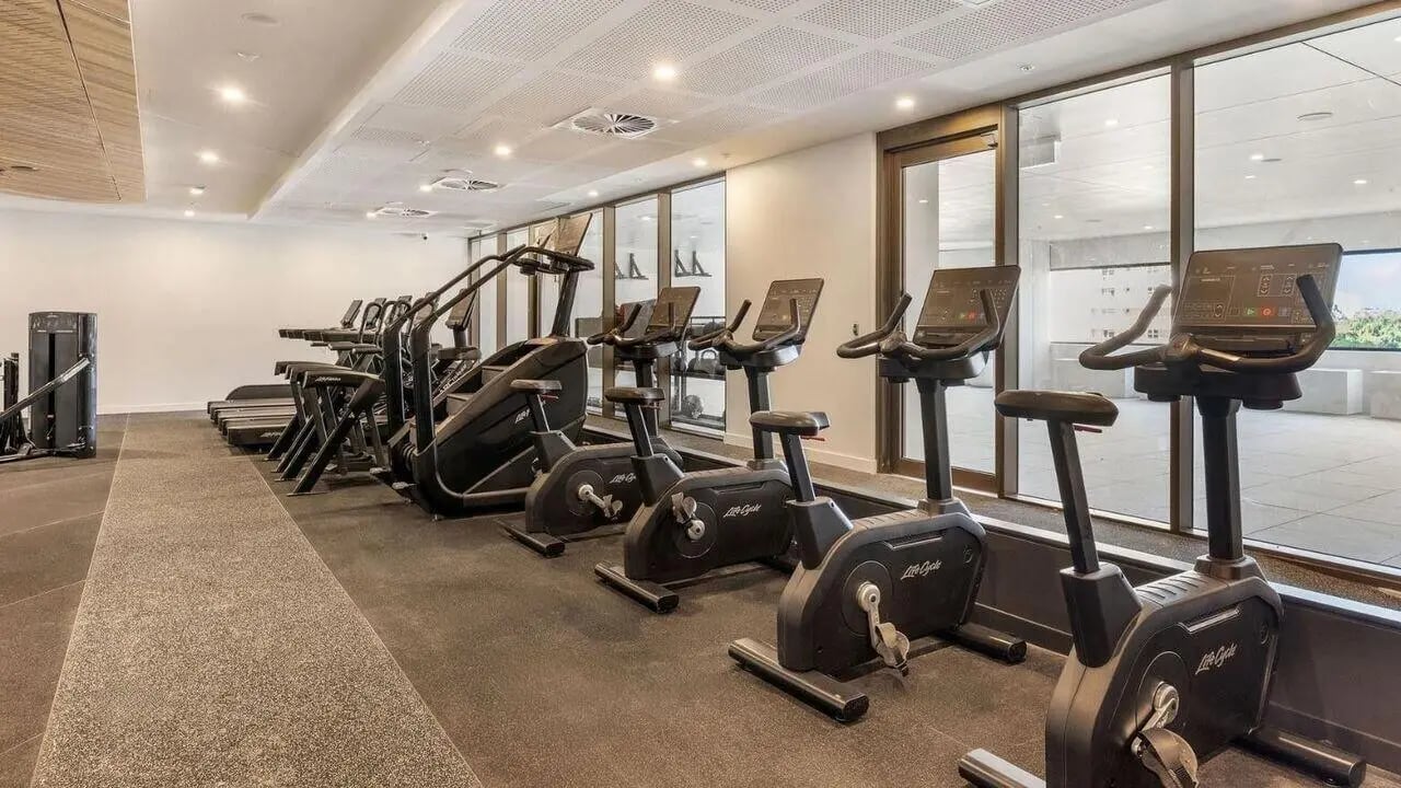 Treadmills stationary bikes gym equipment fitness center at UniLodge Brisbane City in Brisbane Student Accommodation