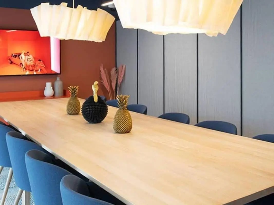 Table with blue chairs and pineapple decorations common area at Silk Mill Edinburgh in Edinburgh Student Accommodation