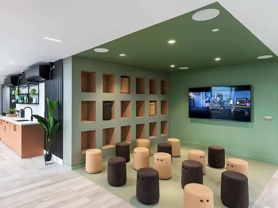 Shelves television and stools recreation area at Bridle Works Glasgow in Glasgow Student Accommodation