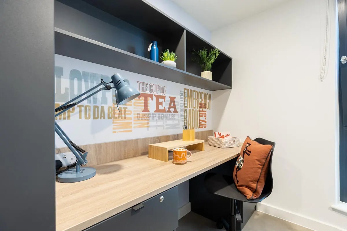Desk with lamp mug and pillow Study Area at Croft Court in Bristol Student Accommodation