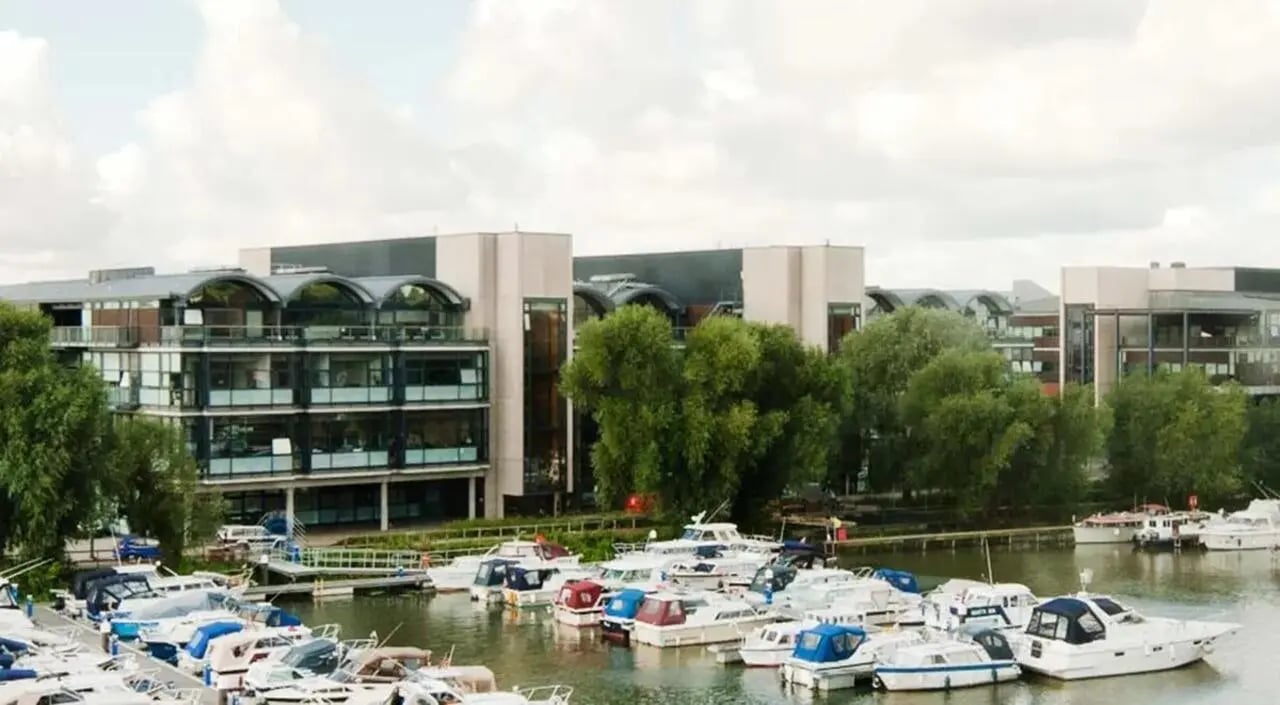 Modern buildings with arched windows boats docked exterior at Brayford Quay in Lincoln Student Accommodation
