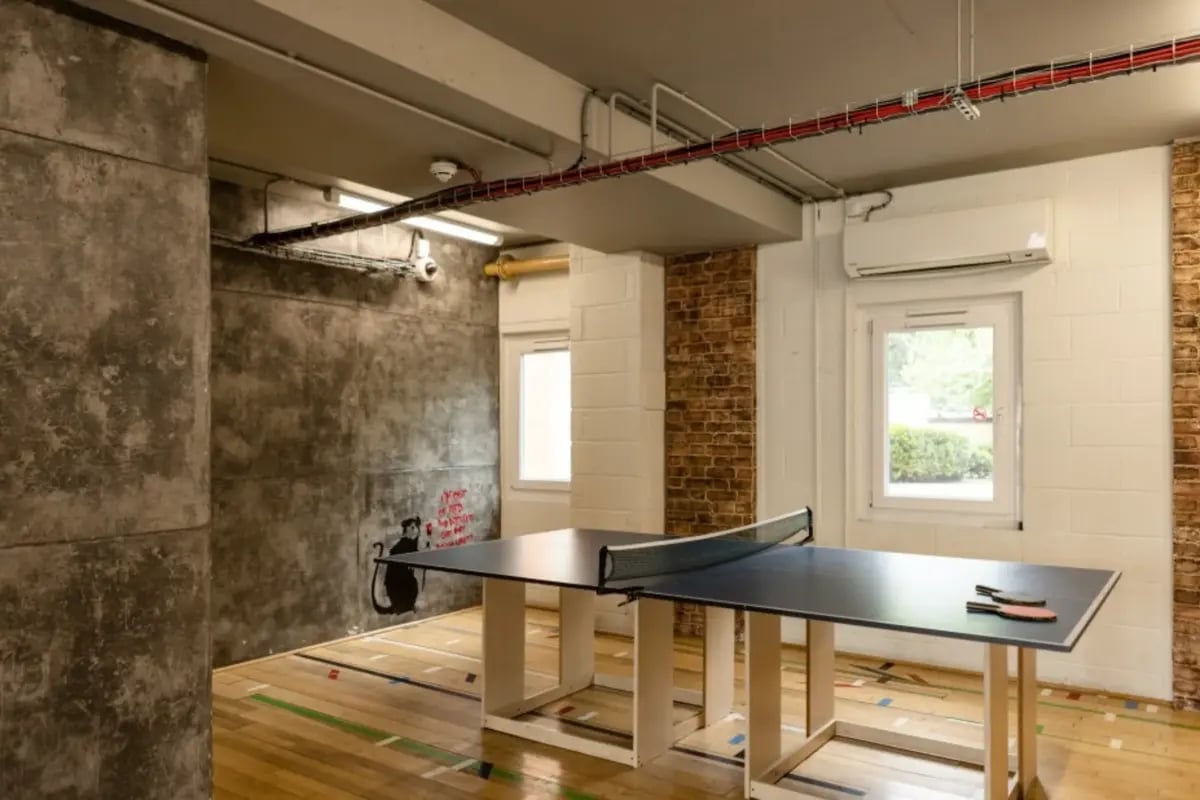 Ping pong table with racquets playing area at Mcmillan student Village in Greenwich Student Accommodation