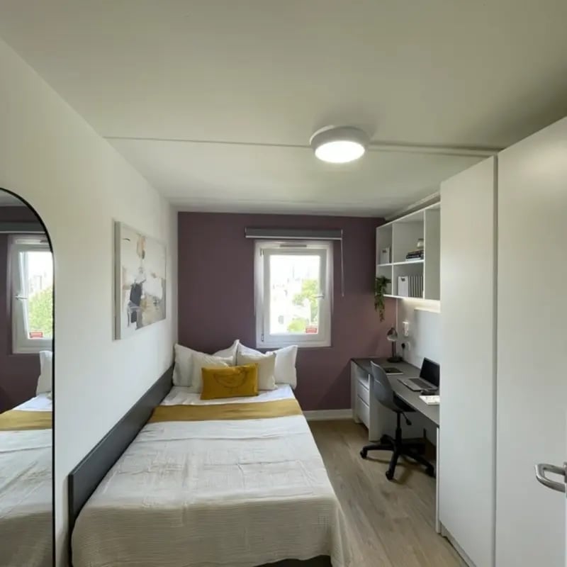 Bed desk shelves mirror bedroom at Mcmillan student Village in Greenwich Student Accommodation