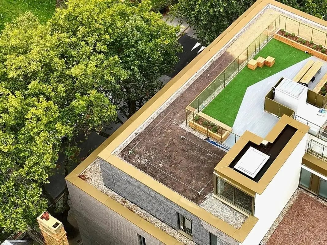 Rooftop garden with artificial grass and seating Exterior at View Studios in London Student Accommodation