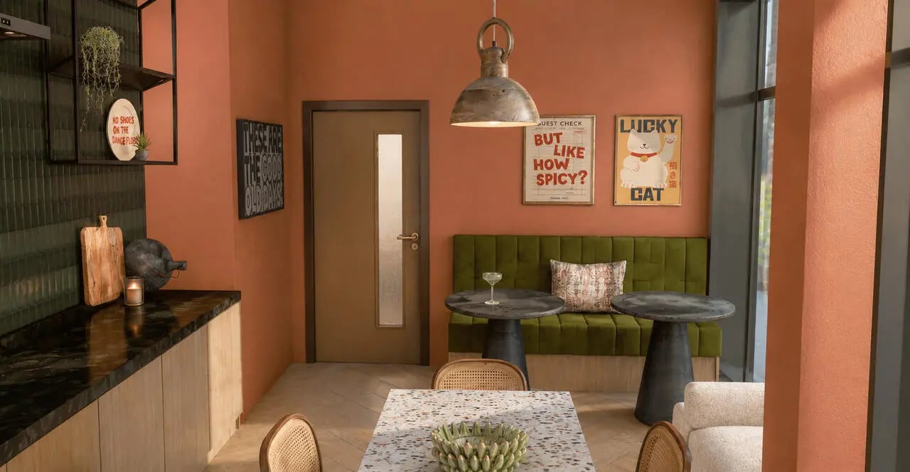 Kitchen island green seating and table common area at Compass in Birmingham Student Accommodation