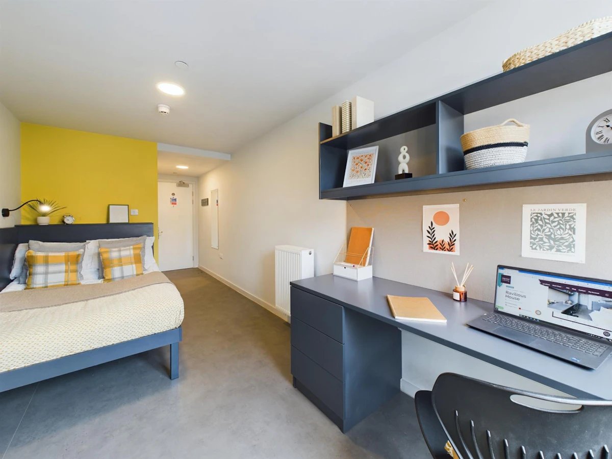 Bed desk and shelves bedroom study area at Ravilious House in Brighton Student Accommodation