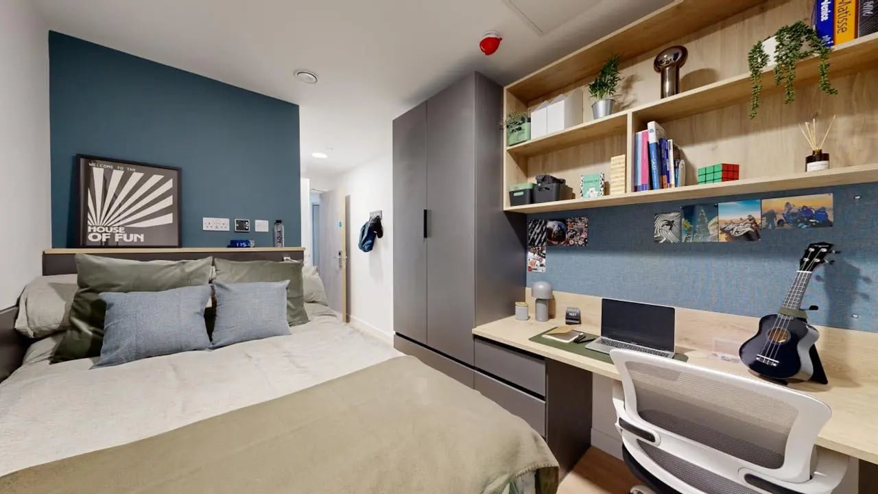 Bed desk shelves and guitar bedroom at Fabric in Nottingham Student Accommodation