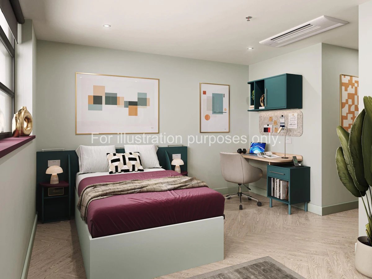 Bed desk and storage units bedroom interior at Willen House in London Student Accommodation