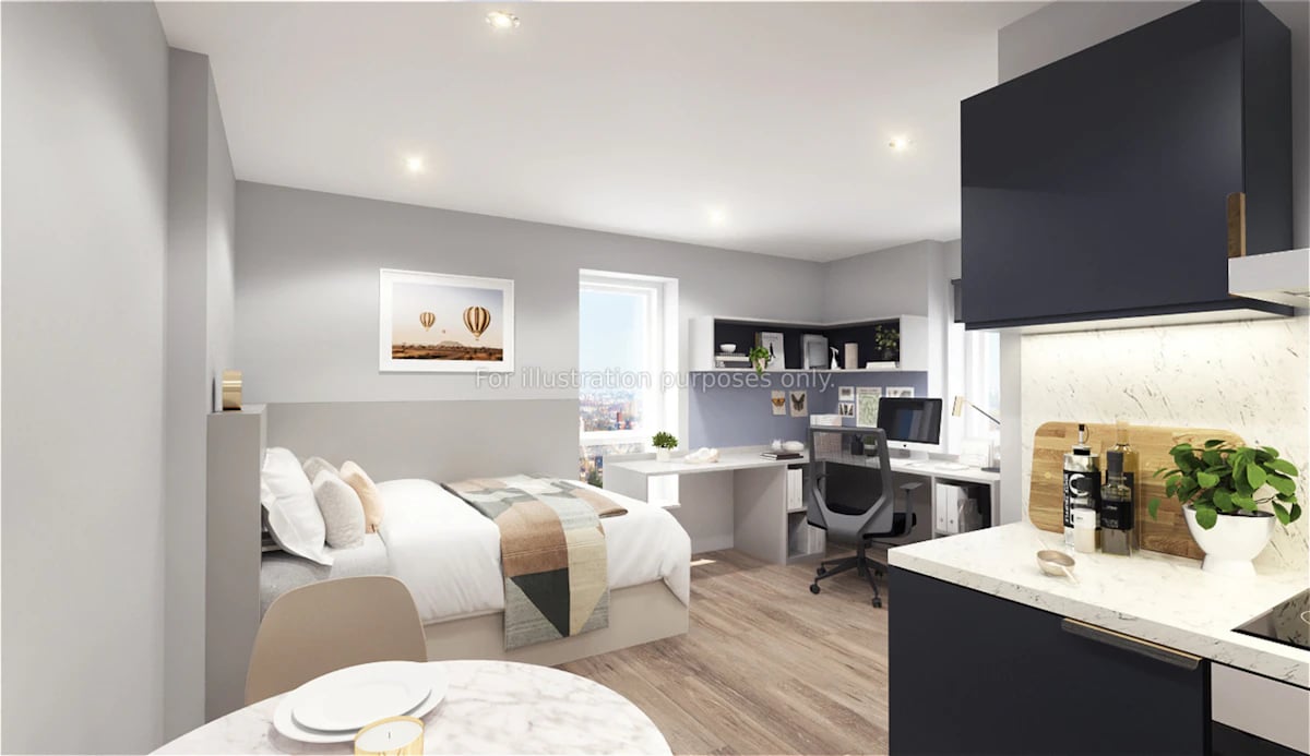 Bed desk and kitchen area bedroom at Clyde Court in Glasgow Student Accommodation