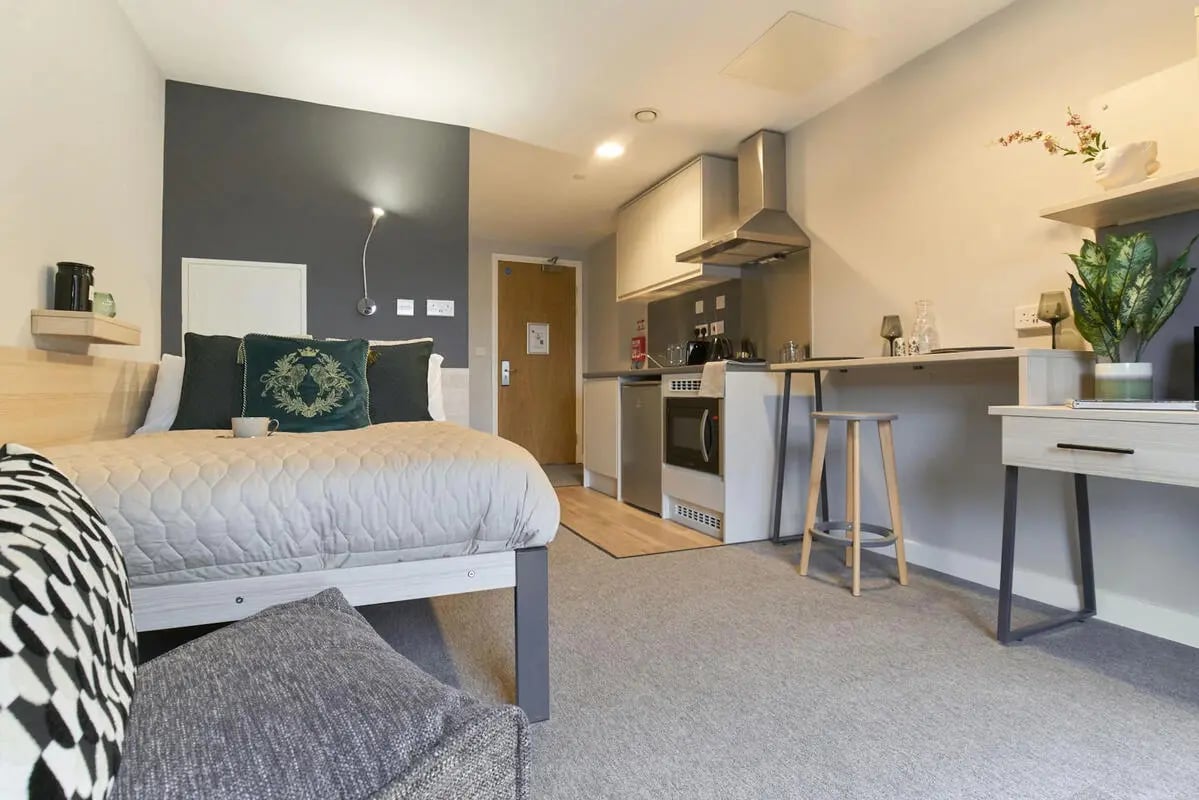 Bed kitchen area desk stool study area at Straits Manor in Sheffield Student Accommodation