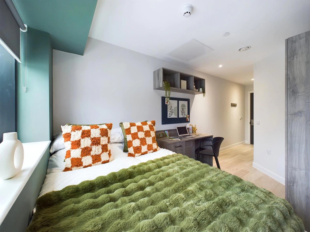 Bed desk with laptop and chair bedroom at Crown Place - Nottingham in Nottingham Student Accommodation