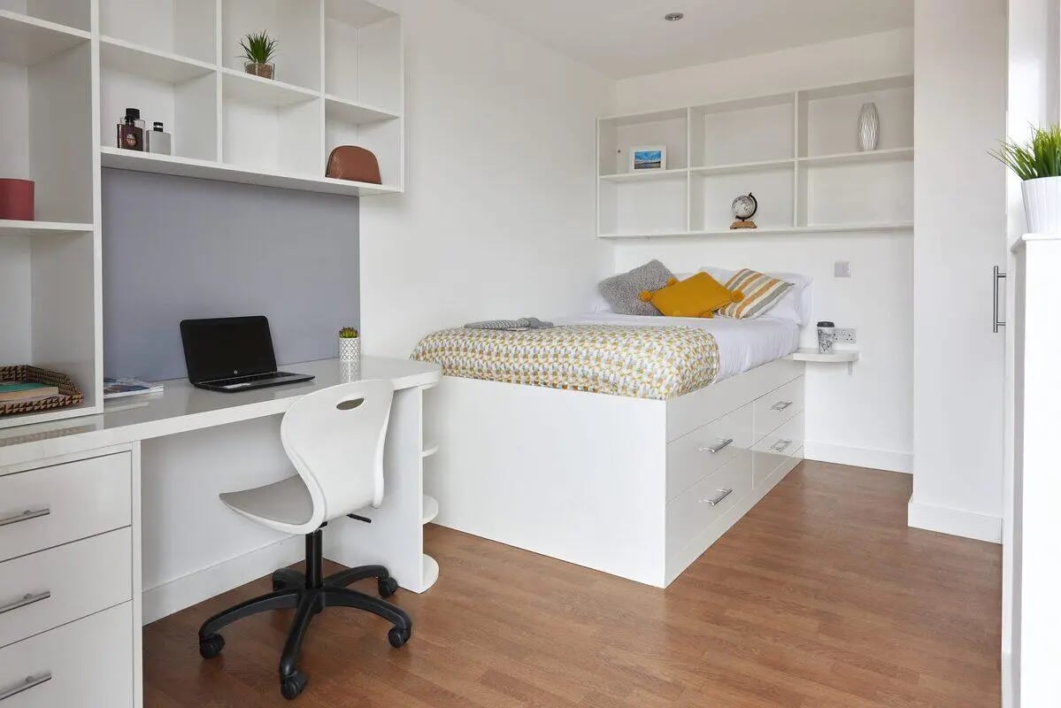 Bed desk shelves and chair student room at Hope Street in Liverpool Student Accommodation