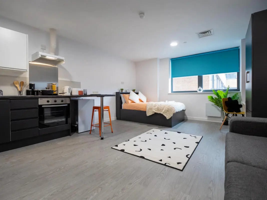 Kitchen bed sofa rug living room at Northgate House in Derby Student Accommodation