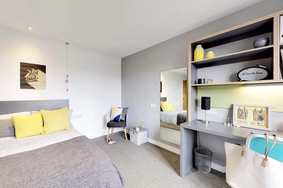 Bed desk chair mirror and shelving bedroom at St James Glasgow in Glasgow Student Accommodation