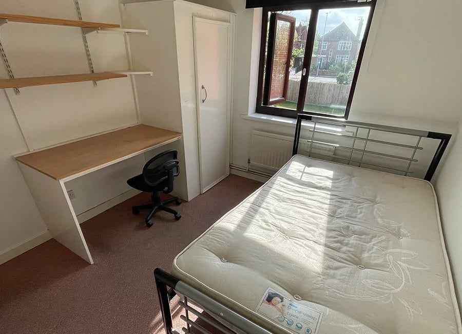 Bed desk wardrobe window bedroom at Kingfisher Halls in Loughborough Student Accommodation