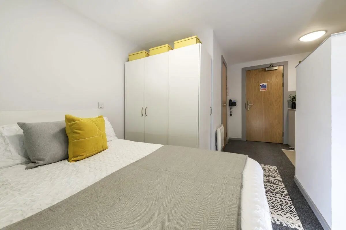 Bed wardrobe door and telephone bedroom at Marshall Court in Newcastle Upon Tyne Student Accommodation
