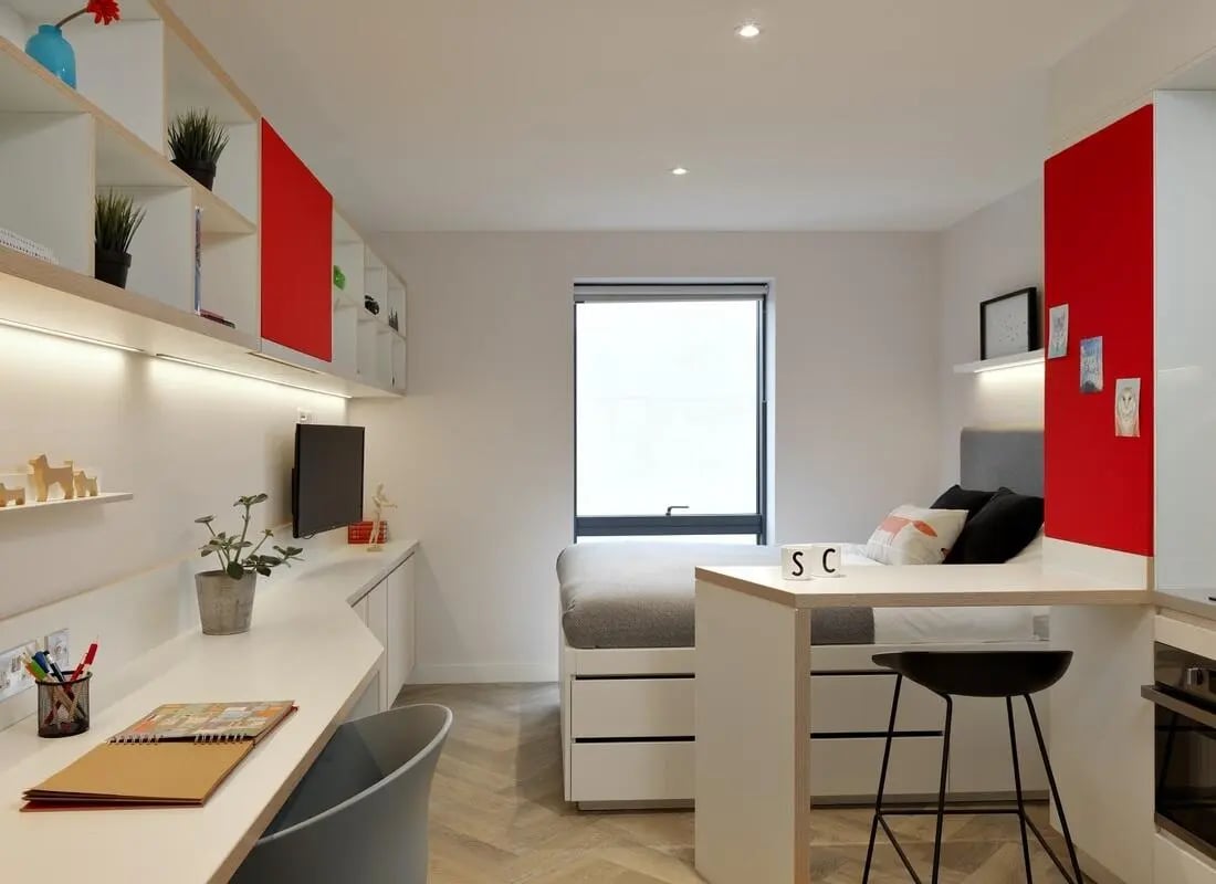 Desk bed shelving and breakfast bar study area at Student Castle Cambridge in Cambridge Student Accommodation