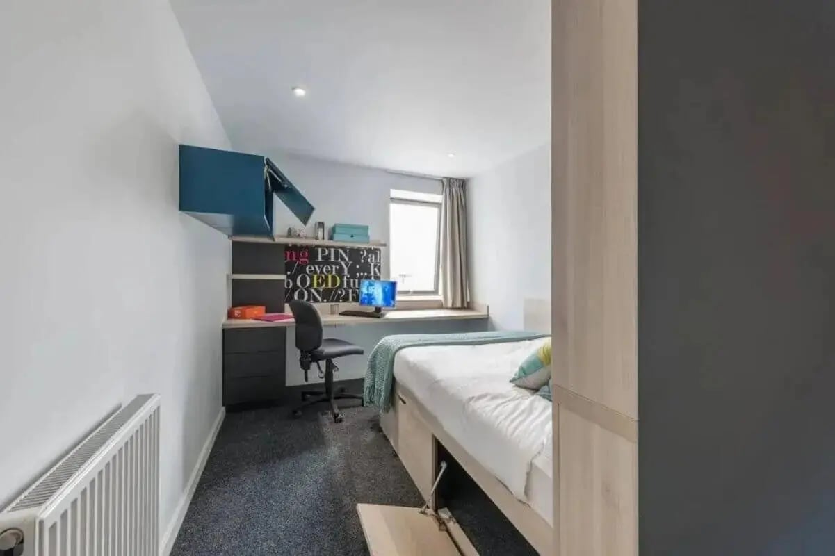 Desk bed and radiator bedroom at CitySide in Leeds Student Accommodation