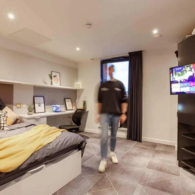 Bed desk chair and TV bedroom at True Birmingham in Birmingham Student Accommodation