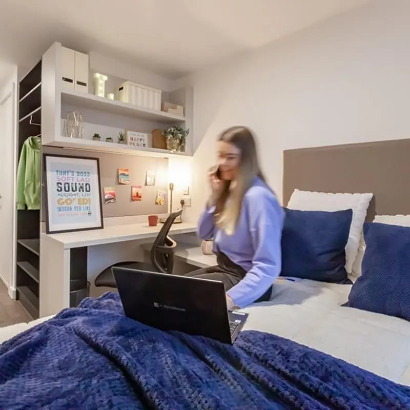 Student desk bed and closet bedroom at True Liverpool in Liverpool Student Accommodation
